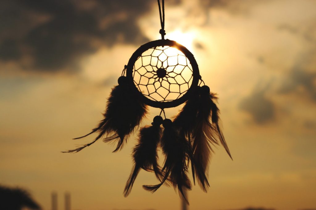 silhouette of hanging dreamcatcher