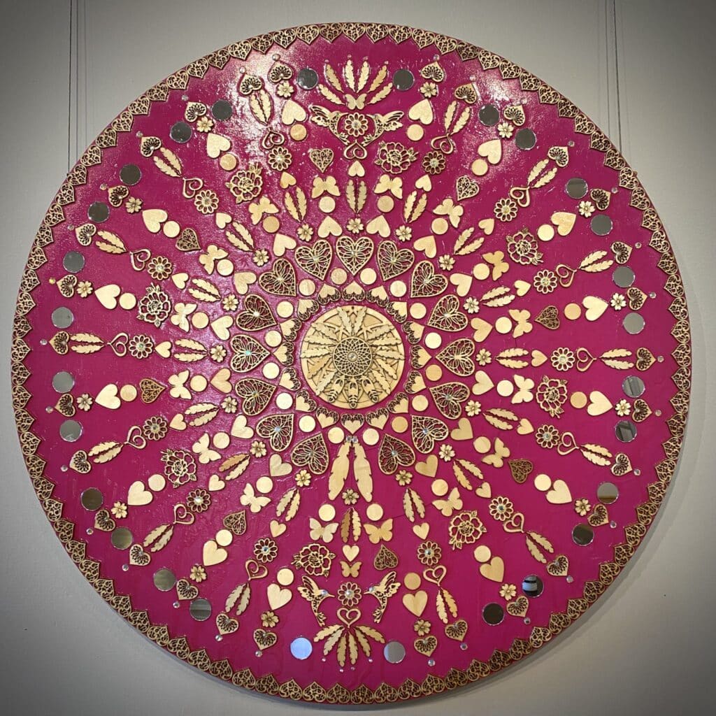 Mandala with red background and symmetrical pieces in circle