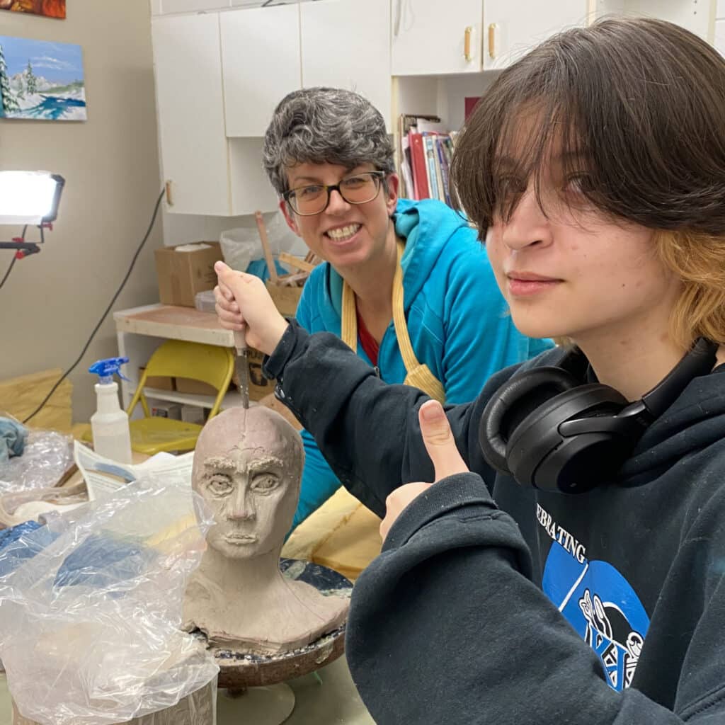 Atlas Lister and Kelly Klick in clay studio