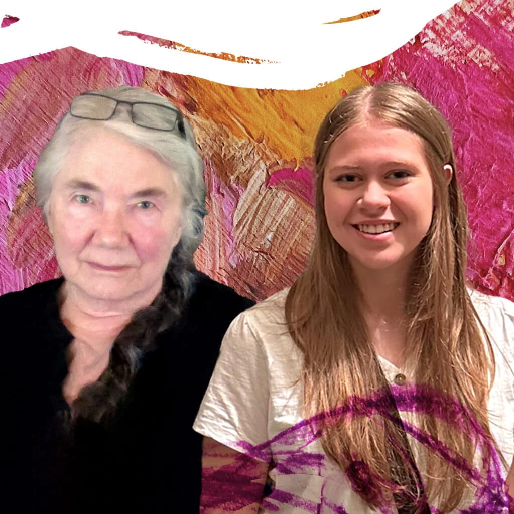 Woman with white hair and glasses on head on left with woman with long light brown hair, smiling at camera on right.
